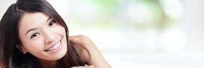 girl with pearly white teeth from the dentist in Troy NY