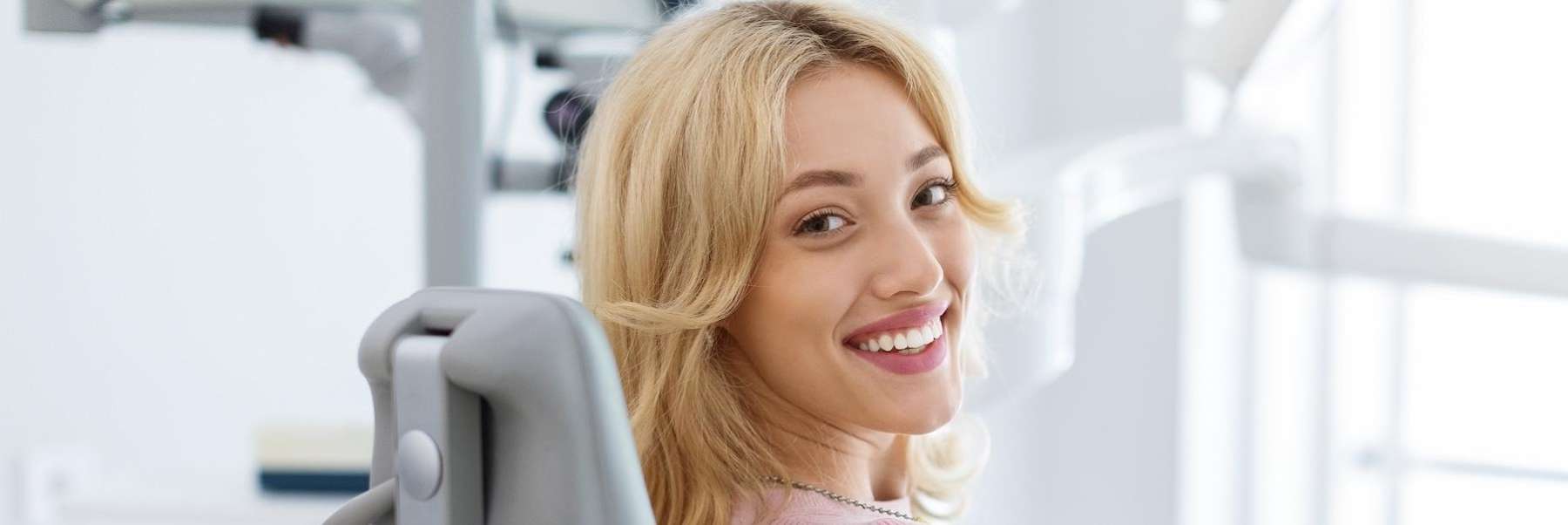 girl smiling after getting a root canal treatment in troy ny