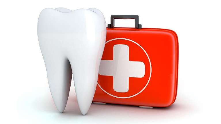 illustrated tooth next to first aid kit