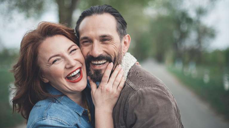 a couple smiling